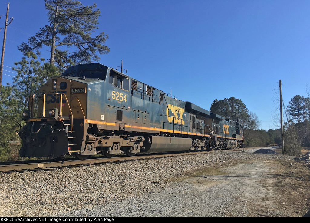 CSX 5254 and 201 run light